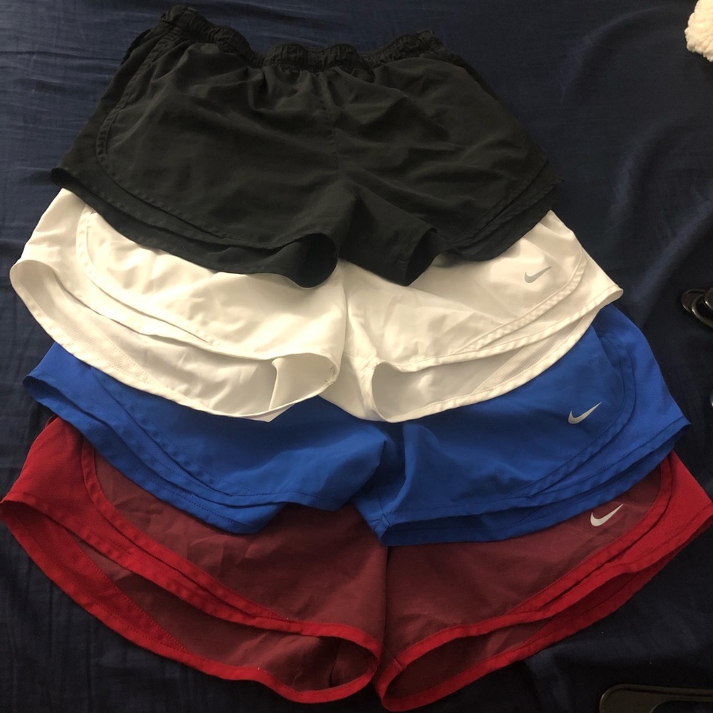 4 pairs of Nike Dri-Fit running shorts!